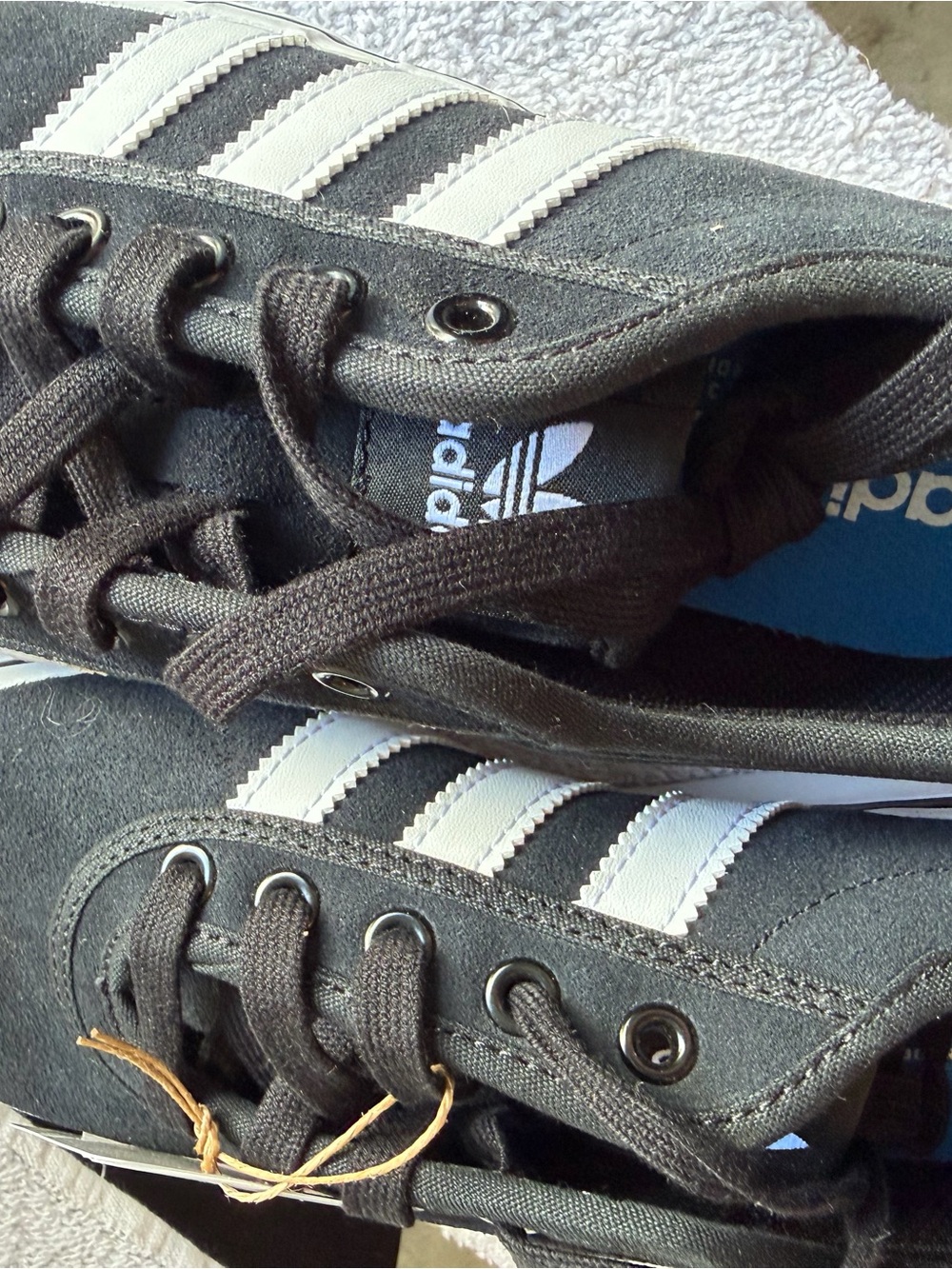 adidas Men’s Black Sneakers with White Stripes